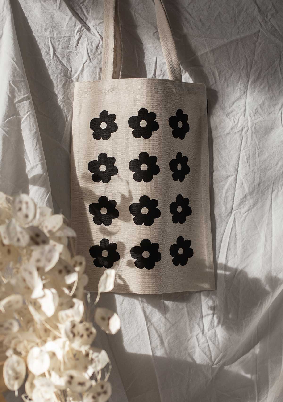 Tote bag with black flowers print by romanian designer Mauverien.