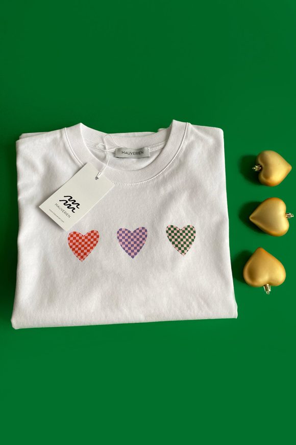 White cotton t-shirt with 3 coloured hearts print and Muaverien label.