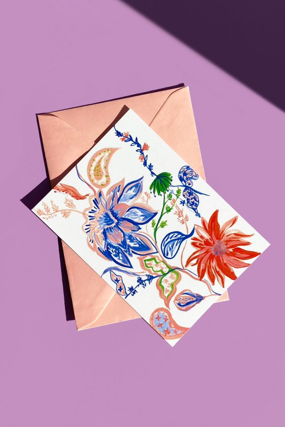 Greeting Card with Abstract Flowers and pink envelope.
